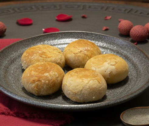 Pork Mooncakes Plate of 4 authentic Shanghai style mooncakes with flaky pastry and juicy pork filling.